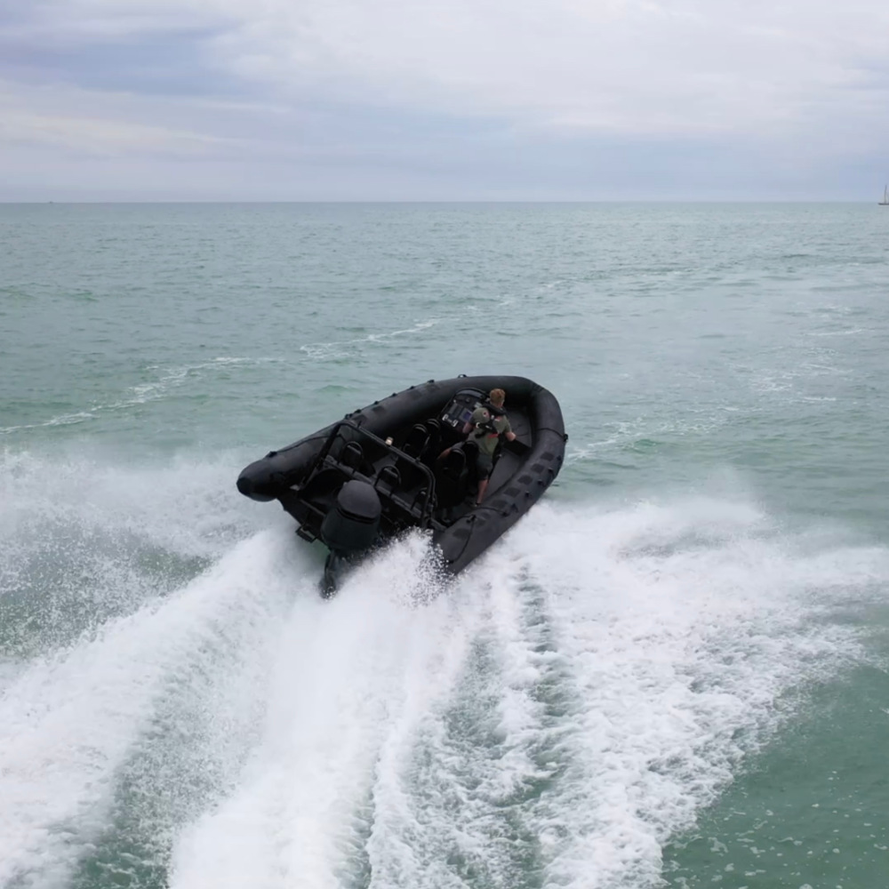 image shows the powerboat perform a high speed turn 