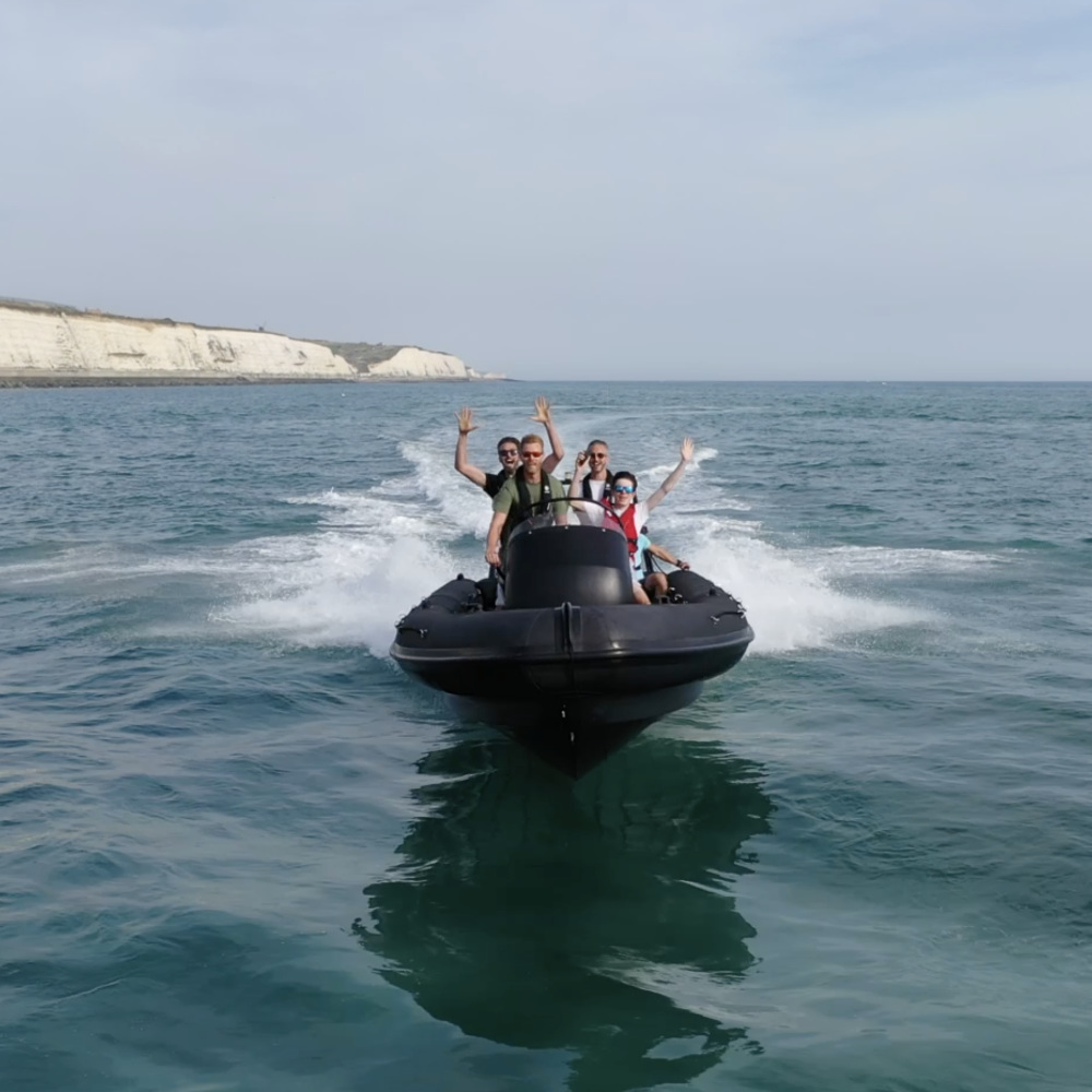 A group of ocean enthusiasts enjoying an epic ride out on the RIB.